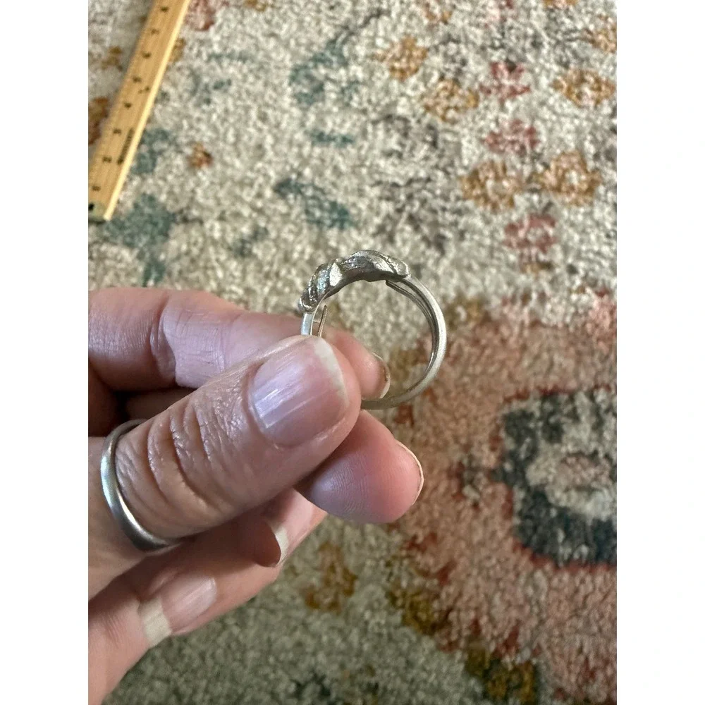 Vintage‎ Avon Silver Tone Textured Love Knot Cocktail Ring OS Statement Bow
